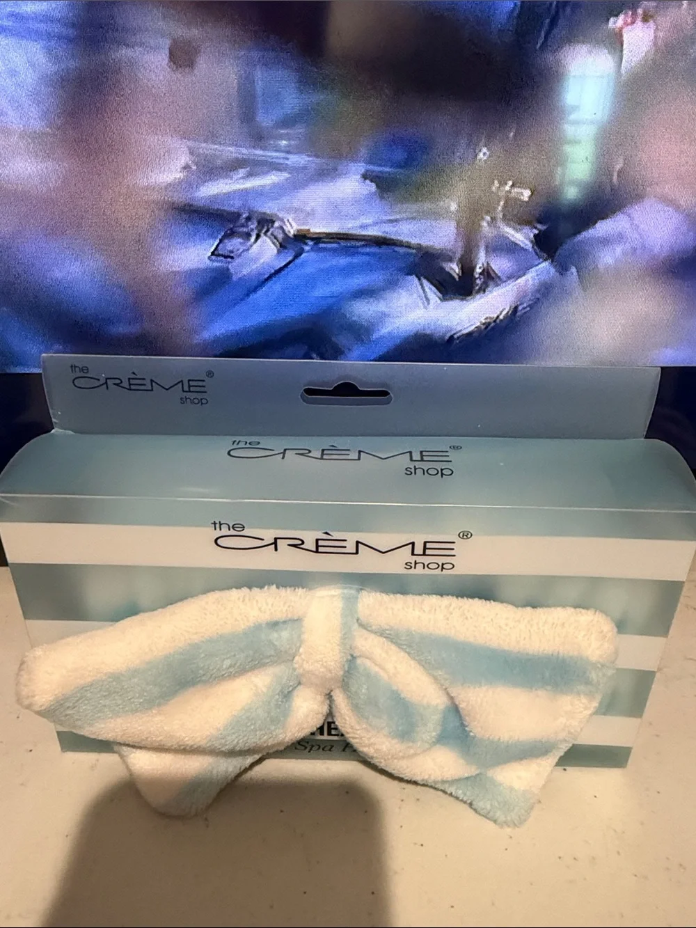 The Crème Plush Teddy Headband in Light Blue & White